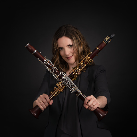 Simone Weber holding bassoons